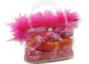 Every toy for any cat, all in time for holiday fun. Plastic purse with feathery pink edging stuffed with catnip toys.